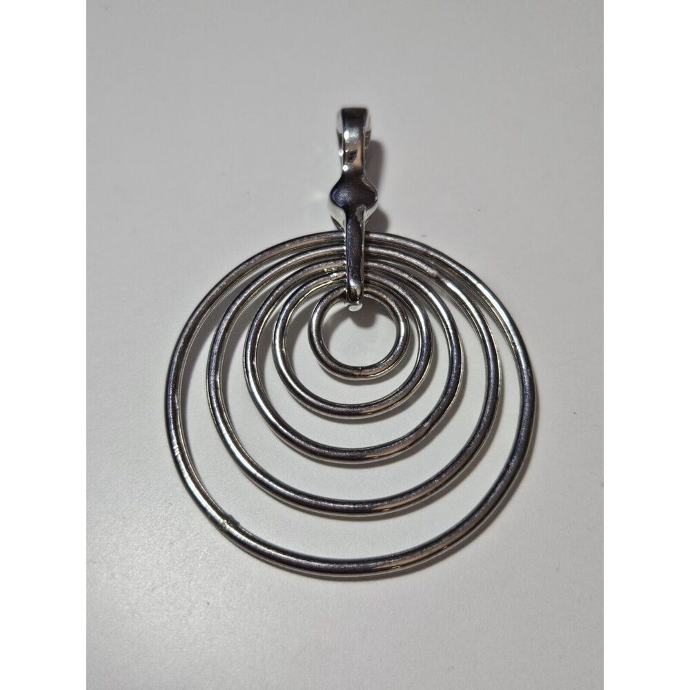 Roman silver tone pendant round circular